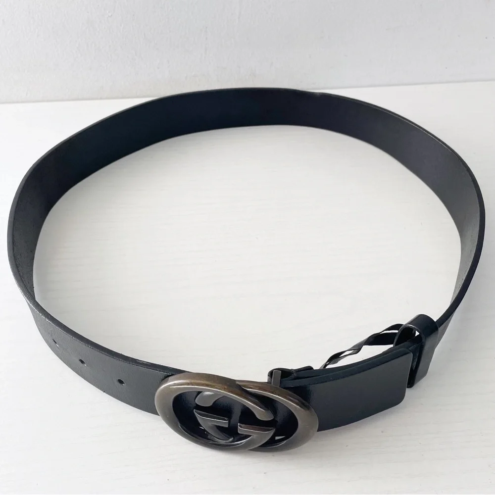 Gucci black leather solid bronze interlocking GG buckle belt